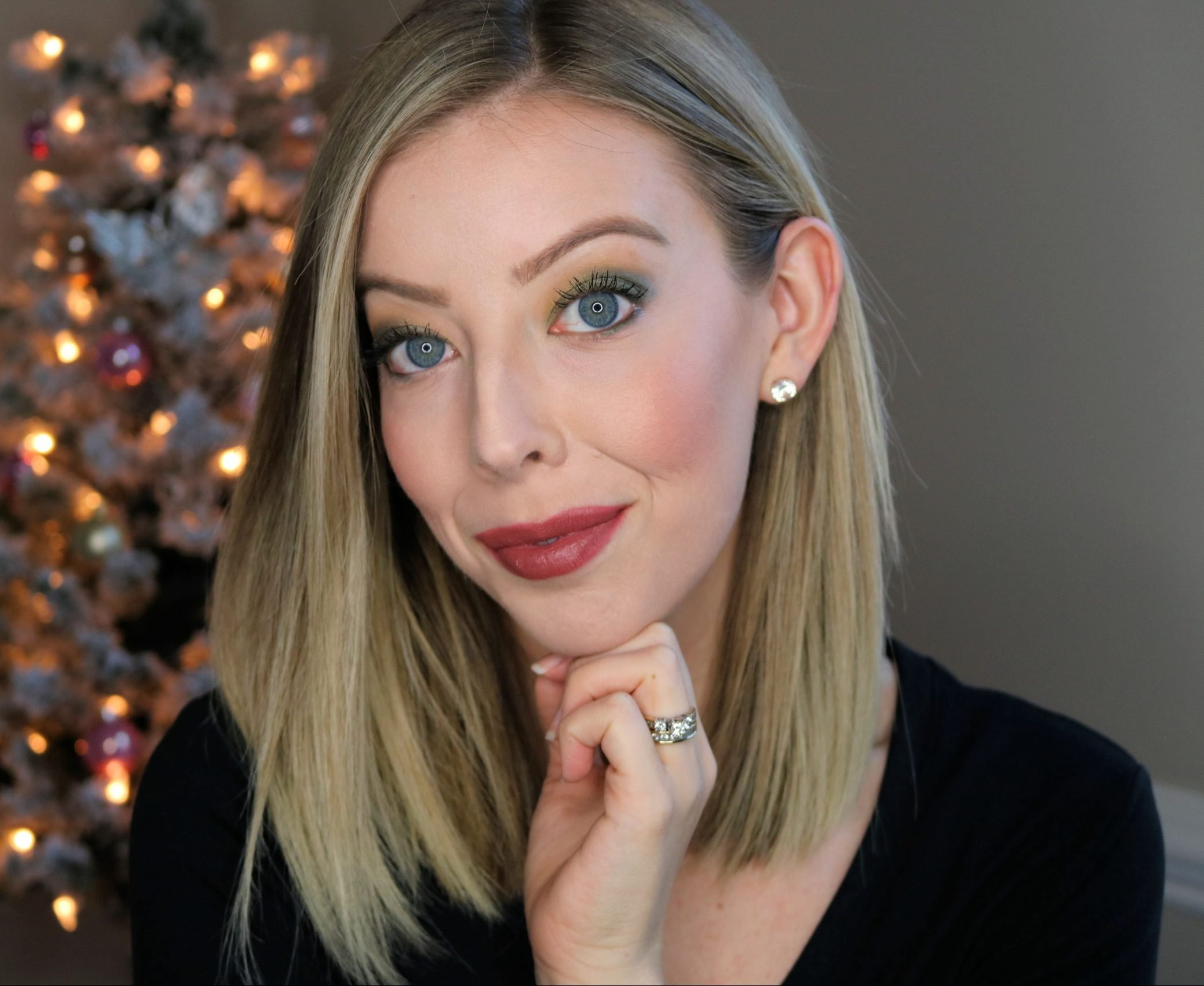 This easy holiday makeup look features a beautiful green eyeshadow with touches of gold shimmer and is perfect for wearing to Christmas and holiday parties. Check out all the makeup products used in my post! #holidaymakeup #makeup #makeuptutorial #drugstoremakeup #greeneyeshadow
