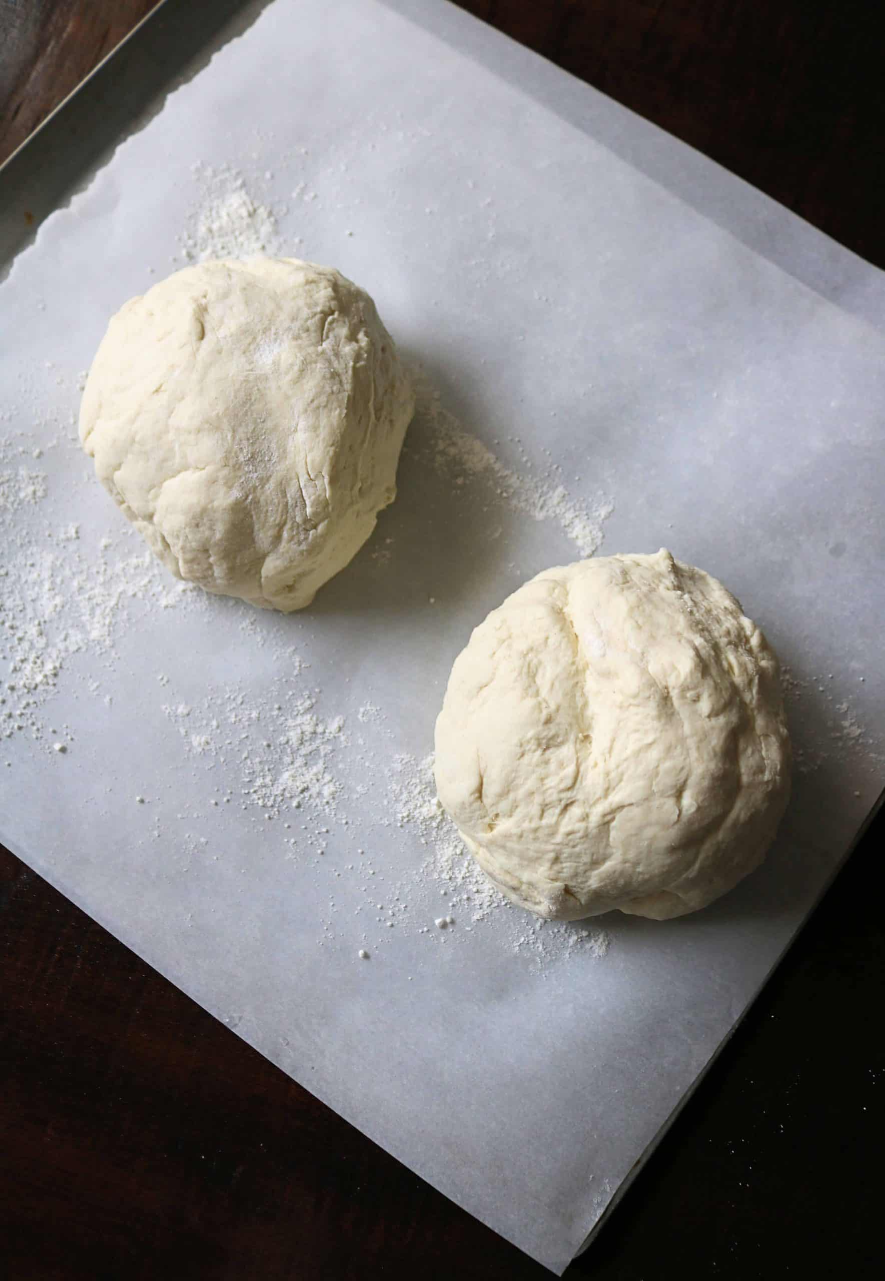 This Easy 2 Ingredient Pizza Dough with Self Rising Flour makes the most delicious pizza crust with no yeast or rising time required! Try my simple and healthy Weight Watchers Pizza Dough made with plain non-fat Greek yogurt and self-rising flour for your next homemade pizza night, and use it for pizza dough, cheese sticks, pretzel bites, and more! #pizzadough #pizza #weighwatchers #greekyogurtpizzadough #selfrisingdough