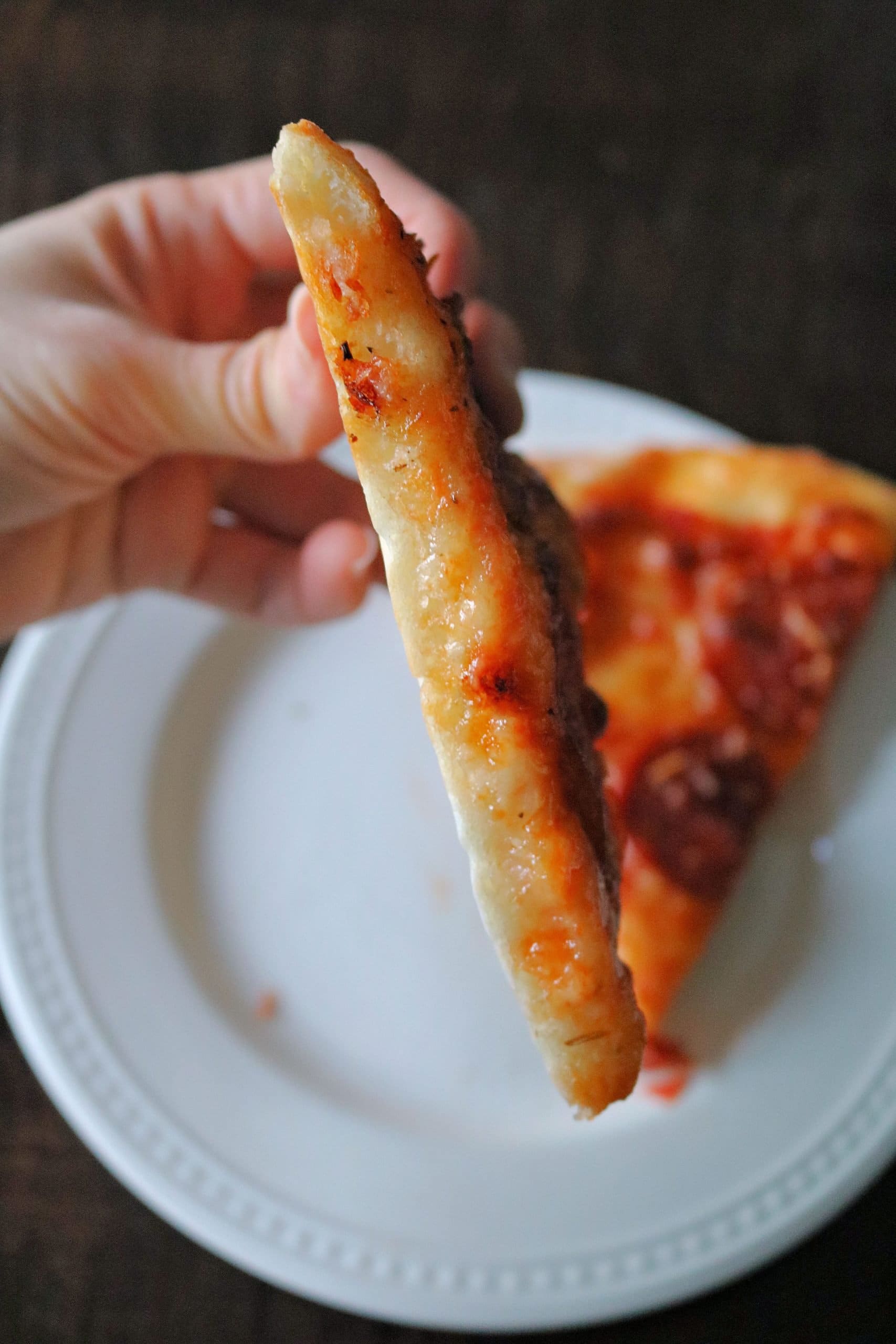 This Easy 2 Ingredient Pizza Dough with Self Rising Flour makes the most delicious pizza crust with no yeast or rising time required! Try my simple and healthy Weight Watchers Pizza Dough made with plain non-fat Greek yogurt and self-rising flour for your next homemade pizza night, and use it for pizza dough, cheese sticks, pretzel bites, and more! #pizzadough #pizza #weighwatchers #greekyogurtpizzadough #selfrisingdough