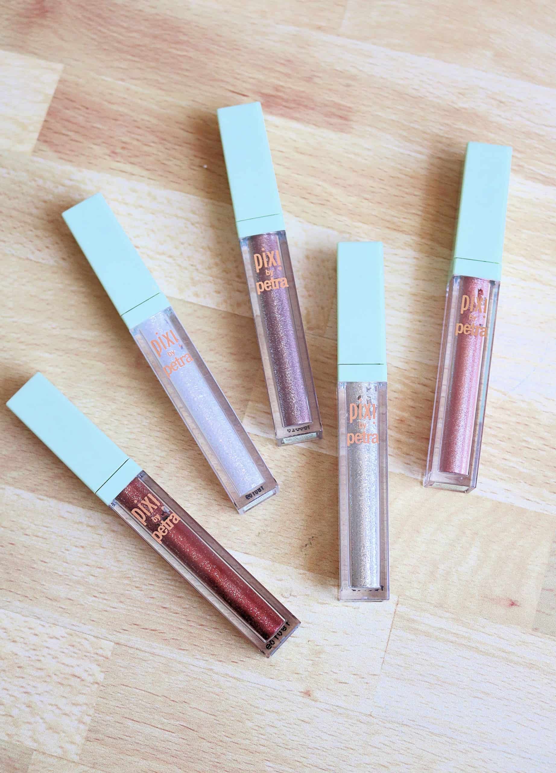 The Pixi Liquid Fairy Lights Glitter Eyeshadows are so beautiful and an affordable alternative to the Stila Glitter and Glow liquid eyeshadows. Check out my full review and swatches of all 5 glitter liquid eyeshadow shades. #pixibeauty #drugstoremakeup #makeupreview