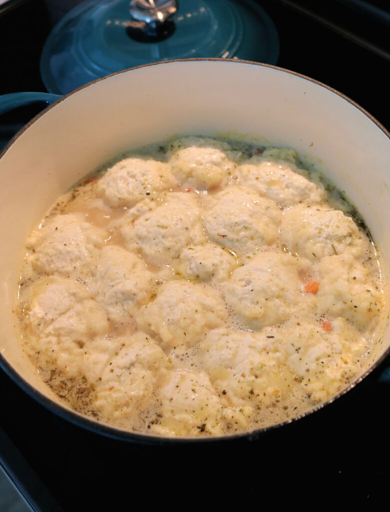 These are the best old fashioned chicken and dumplings you'll ever eat! Featuring tender rotisserie chicken, simple homemade broth, and fluffy self rising flour biscuit dumplings, this delicious and easy recipe is comfort food at its finest.